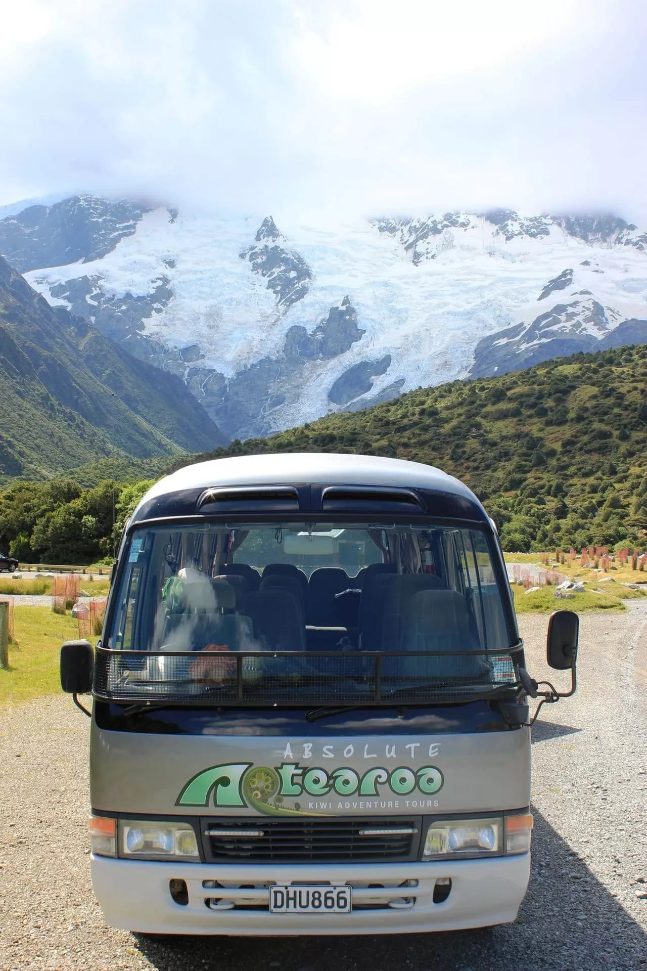 absolute tour van in front of glacier