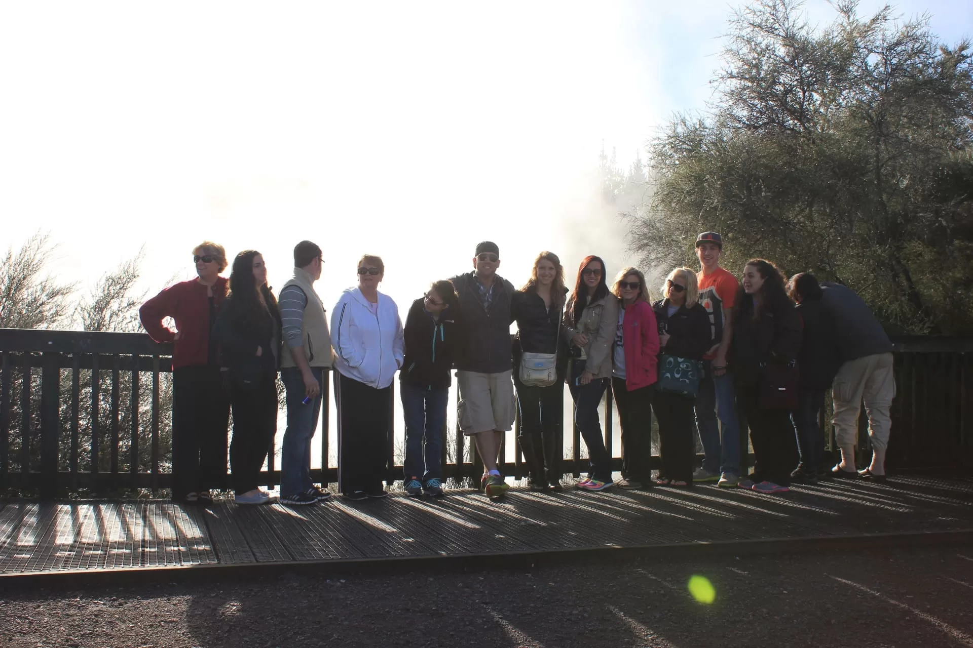 group travel in front of geothermals